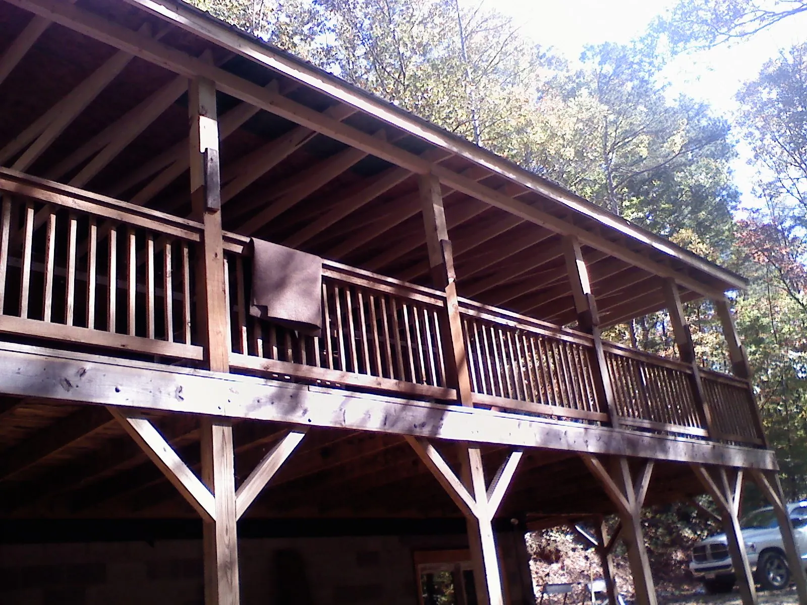 Timber framing under a new elevated porch and deck — Roof Leak Repair in Holden by Roofing Brothers